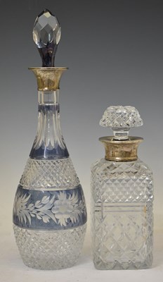 Lot 279 - Two Elizabeth II silver-collared decanters