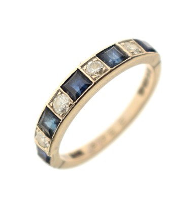 Lot 26 - 18ct white gold sapphire and diamond nine-stone half eternity ring