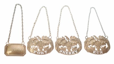 Lot 224 - Victorian silver decanter label together with a set of three silver plated decanter labels