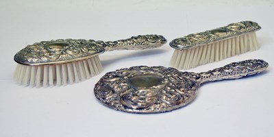 Lot 386 - Elizabeth II silver mounted three piece dressing table set
