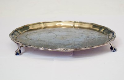 Lot 418 - Elizabeth II silver salver with gadroon edge on three ball and claw feet