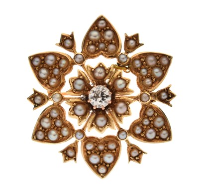 Lot 28 - Edwardian diamond and pearl yellow metal flower head brooch