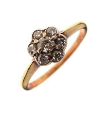 Lot 8 - Diamond daisy cluster yellow metal ring