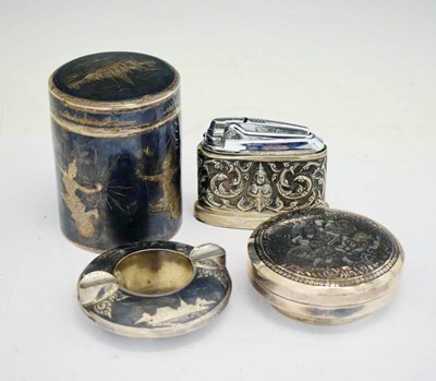Lot 433 - Three Niello decorated items and a Thai white metal mounted table lighter