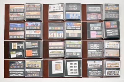 Lot 367 - Collection of Royal Mint Presentation packs in twelve albums