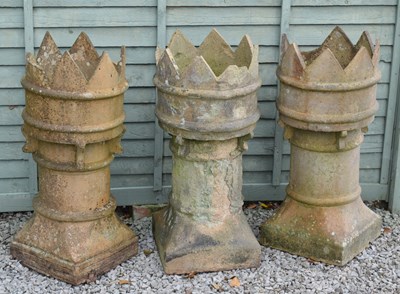 Lot 813 - Set of three terracotta chimney pots/crowns