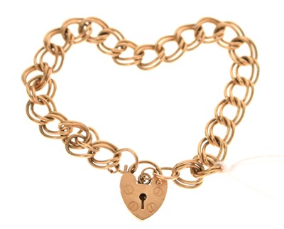 Lot 116 - 9ct gold curb link bracelet with padlock