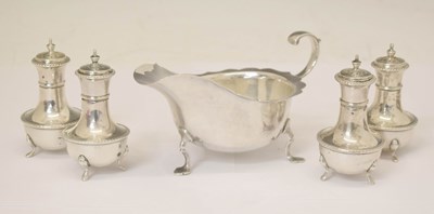 Lot 242 - George V silver sauce boat, together with a George V silver condiment set