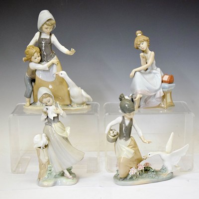 Lot 622 - Lladro - Four porcelain figure groups