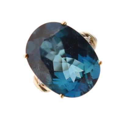 Lot 15 - London blue topaz and diamond 9ct yellow gold ring