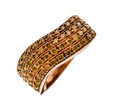 Lot 12 - Yellow diamond four-row 9ct gold dress ring