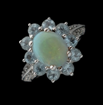 Lot 16 - Opal and aquamarine 9ct white gold cluster ring