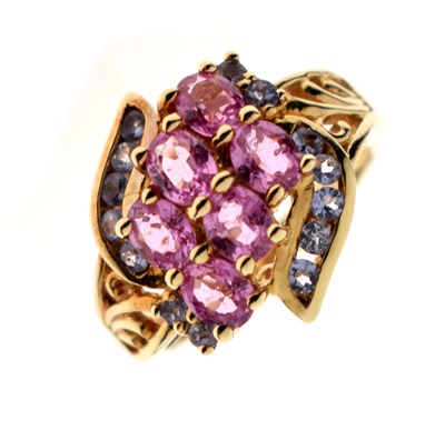 Lot 25 - Pink sapphire and pale purple gemstone 9ct gold dress ring