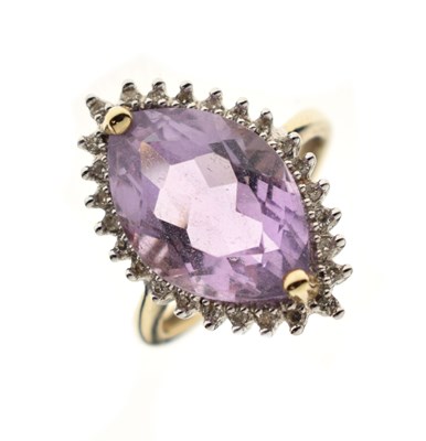 Lot 53 - Amethyst and diamond cluster dress ring