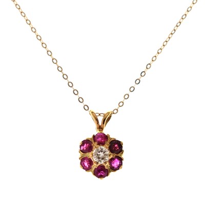 Lot 88 - Ruby and diamond flower head cluster pendant