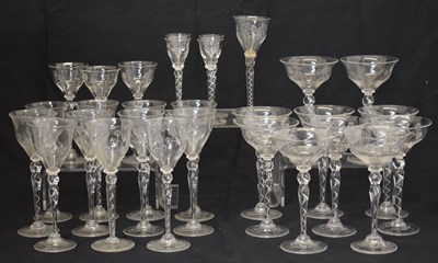 Lot 562 - Part suite of Art Nouveau style etched and air twist stem glassware (29)