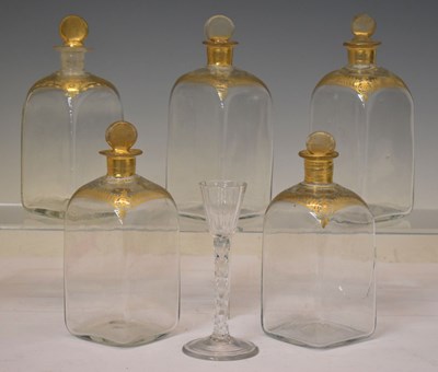 Lot 549 - Five early 19th century gilt blown glass decanters
