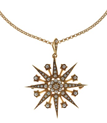 Lot 43 - Victorian seed pearl and diamond yellow metal (stamped 15ct) sunburst pendant / brooch