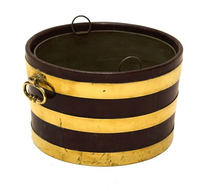 Lot 387 - George III brass-bound mahogany planter