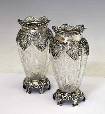 Lot 104 - Pair of early 20th century silver-mounted cut glass vases