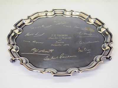 Lot 269 - Elizabeth II silver salver with pie-crust edge and standing on three scroll feet