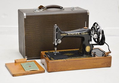 Lot 379 - Cased Singer sewing machine and case