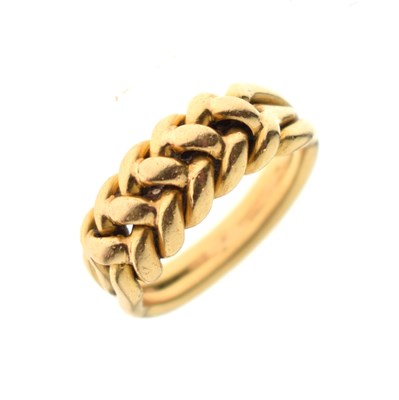 Lot 69 - Yellow metal 'keeper' ring, stamped '18'