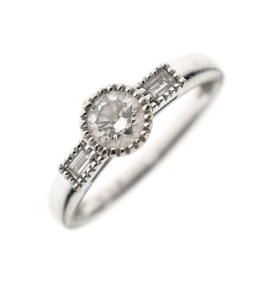 Lot 1 - Diamond single stone ring with baguette cut diamond shoulders