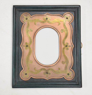 Lot 408 - Arts and crafts / Art Nouveau brass and copper mounted frame