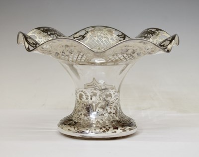 Lot 105 - American glass centerpiece of flared form with overlaid white metal pierced decoration