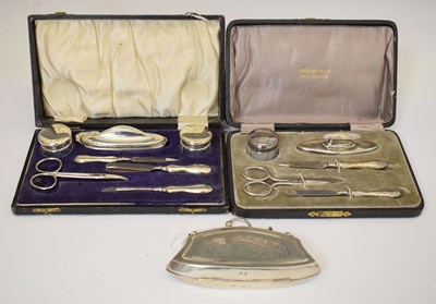 Lot 231 - Two cased silver mounted dressing table requisites, etc