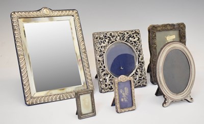Lot 289 - Five silver mounted photo frames together with a silver mounted easel mirror