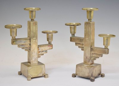 Lot 482 - Pair of silver plated Art Deco style three branch candelabra
