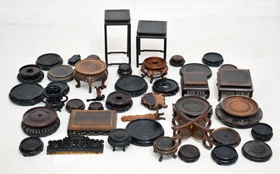 Lot 669 - Collection of turned and carved stained and hardwood stands