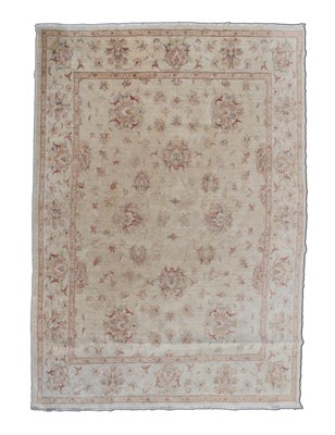 Lot 751 - Cream ground wool rug