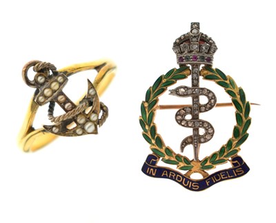 Lot 35 - Royal Army Medical Corps, diamond and enamel regimental badge brooch and a fouled anchor ring (2)