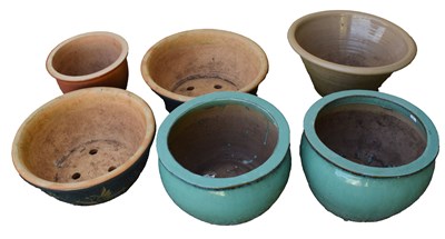 Lot 834 - Six various sized garden planters
