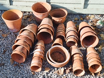 Lot 842 - Group of various sized terracotta flower pots