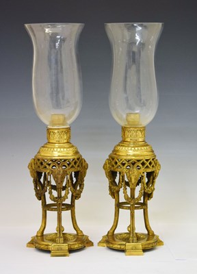 Lot 180 - Pair of French Empire style ormolu storm lanterns