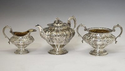 Lot 100 - Matched silver three-piece tea service