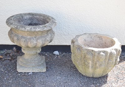 Lot 563 - Two composition stone garden planters