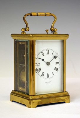 Lot 383 - French brass repeater carriage clock, retailed by Landau of Lucknow