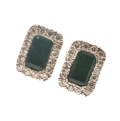 Lot 55 - Pair of emerald and diamond white metal (stamped 18K 750) cluster earrings