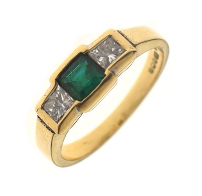 Lot 18 - Emerald and diamond 18ct yellow gold three stone ring