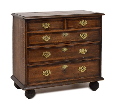 Lot 392 - Small George III oak and mahogany chest of drawers