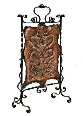 Lot 200 - Arts & Crafts wrought iron and embossed copper fire screen