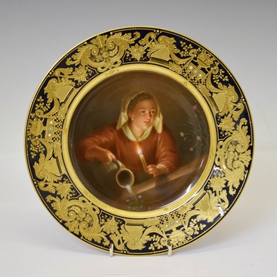 Lot 220 - Vienna type painted porcelain cabinet plate 'Madchen Blumen begiessend' after Gerard Dou