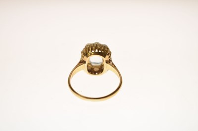 Lot 22 - Aquamarine and seed pearl unmarked yellow metal ring