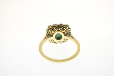 Lot 21 - Emerald and diamond 18ct yellow and white gold set cluster ring