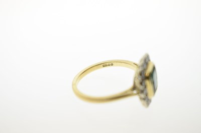 Lot 21 - Emerald and diamond 18ct yellow and white gold set cluster ring